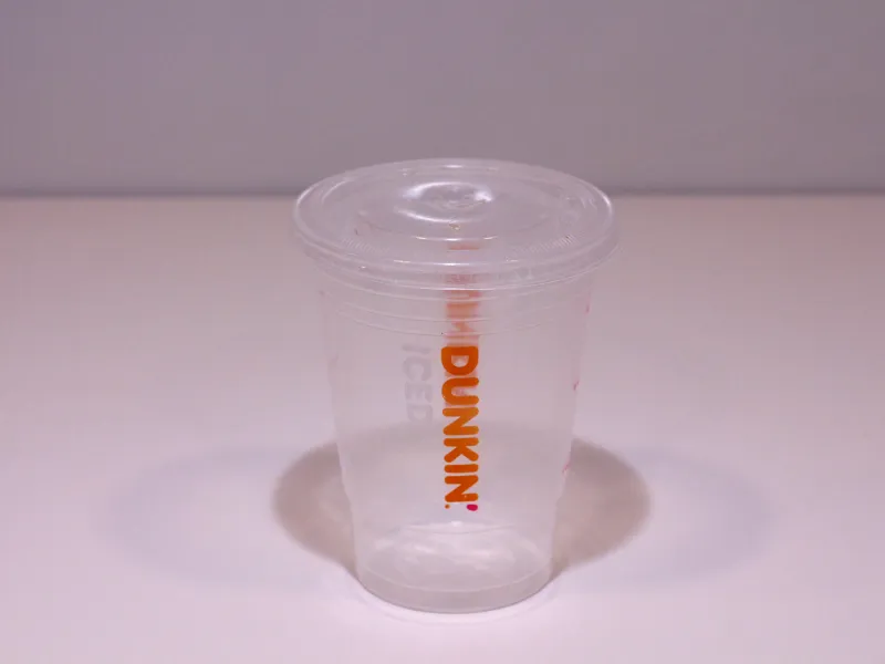 Empty plastic Dunkin Donuts cold cup