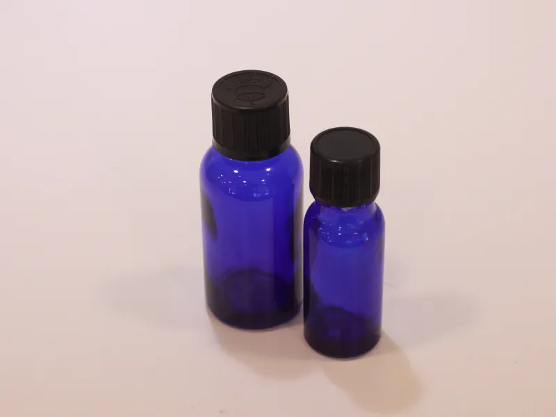 Blue glass makeup bottles