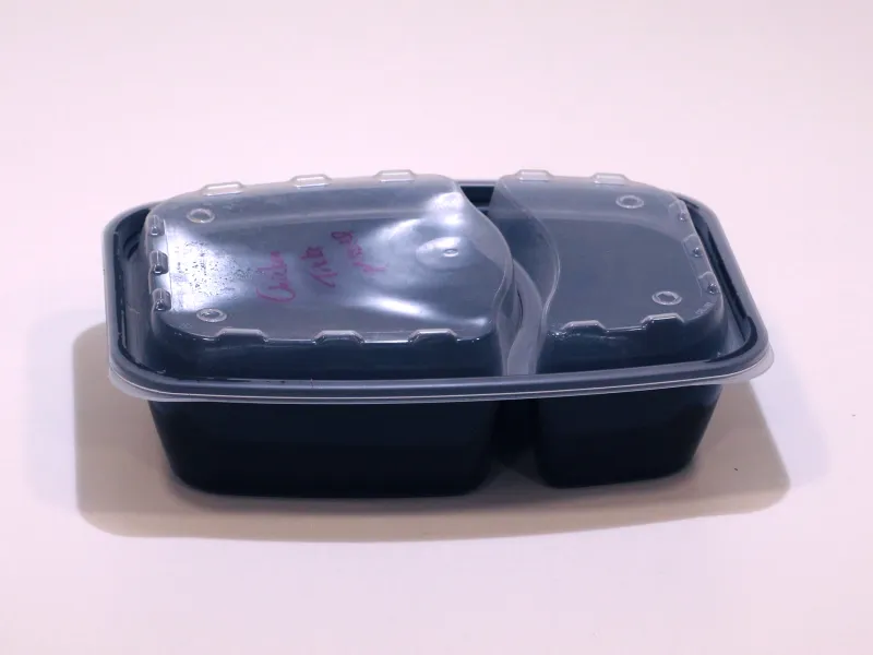 An empty Indian food container