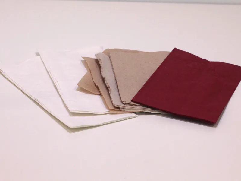 Various napkins fanned out on a table