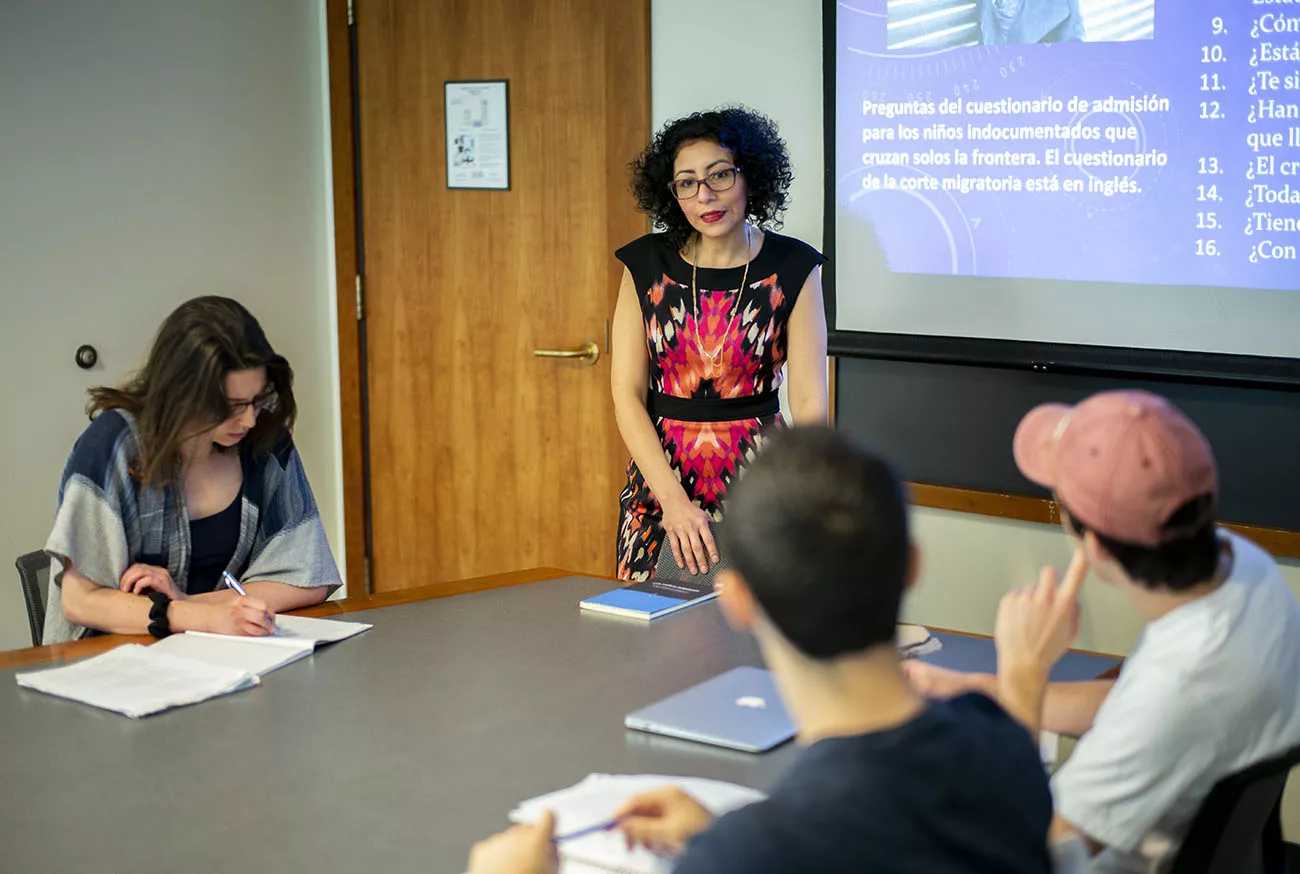 professor talking with students