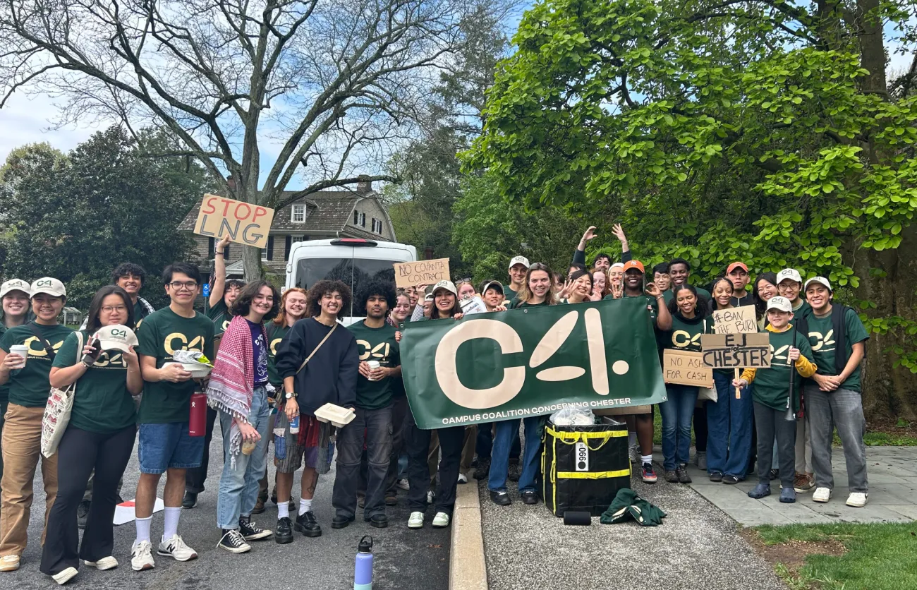 C4 students gather with protest signs
