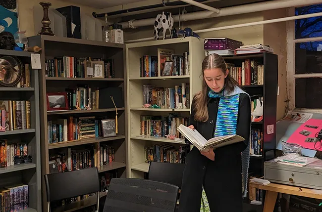 student in the science fiction club, Psi Phi, meeting room