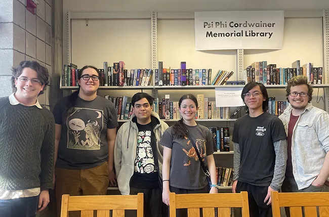 Psi Phi Club students celebrate their growing collection, now housed in Cornell Library