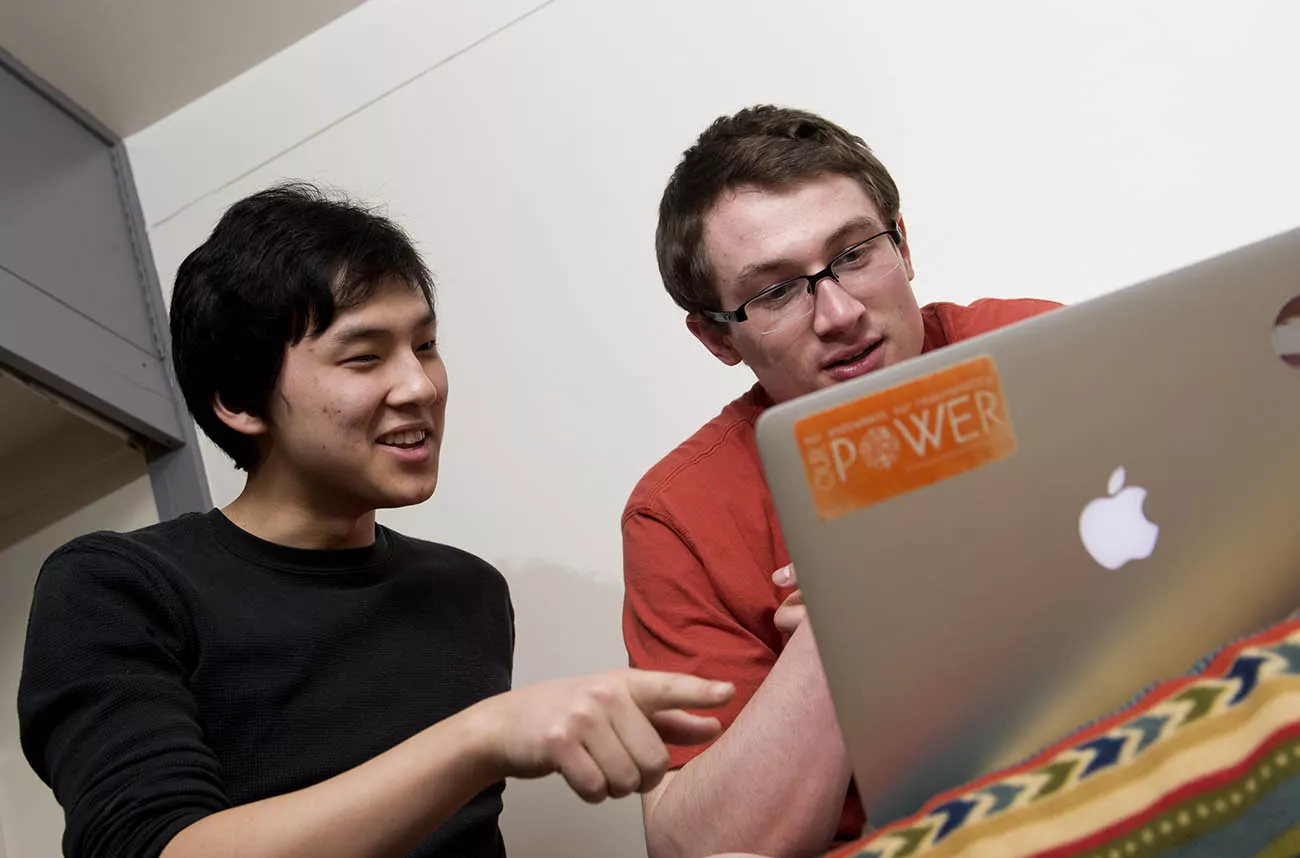 students watching laptop