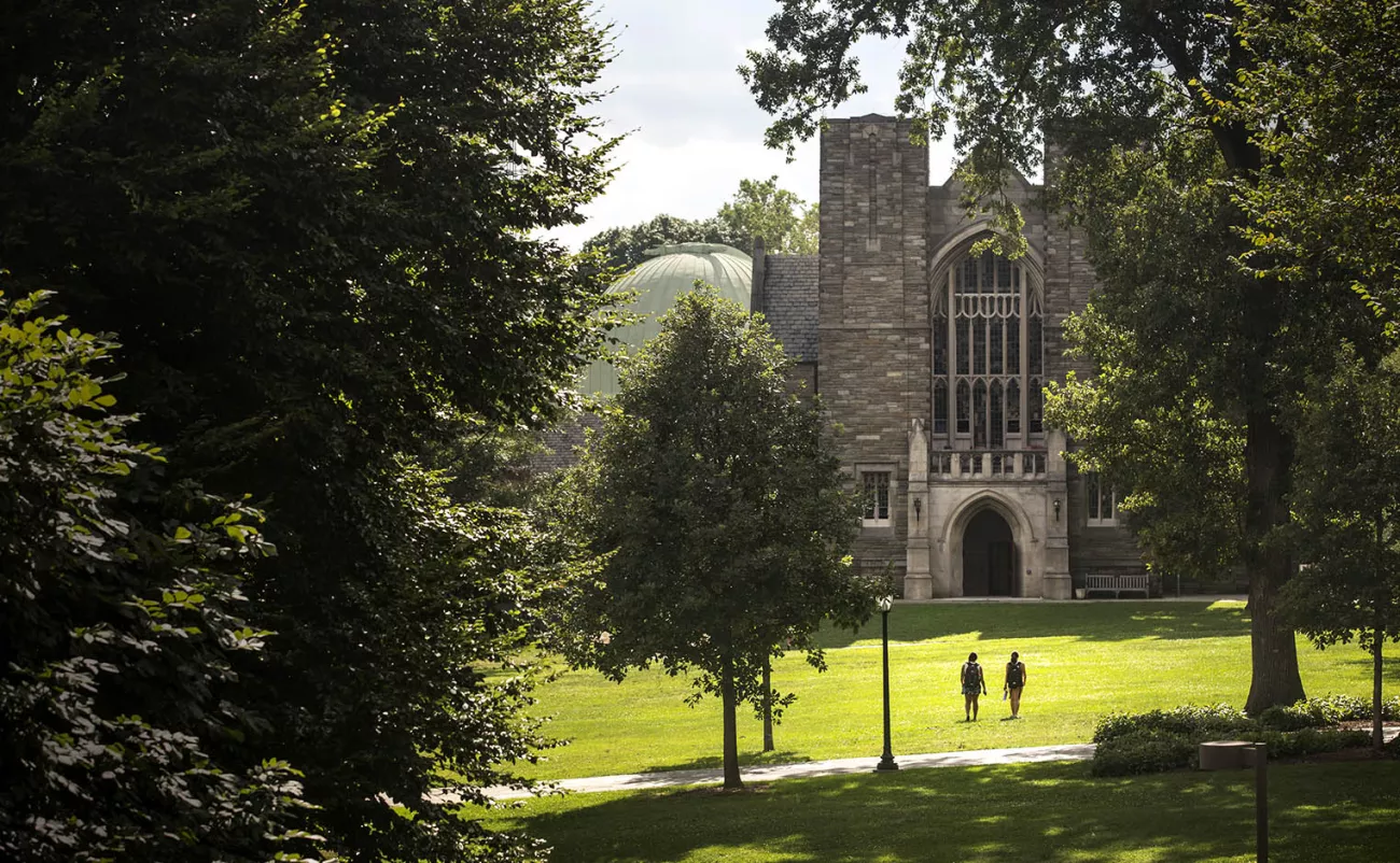 two students walking on campus