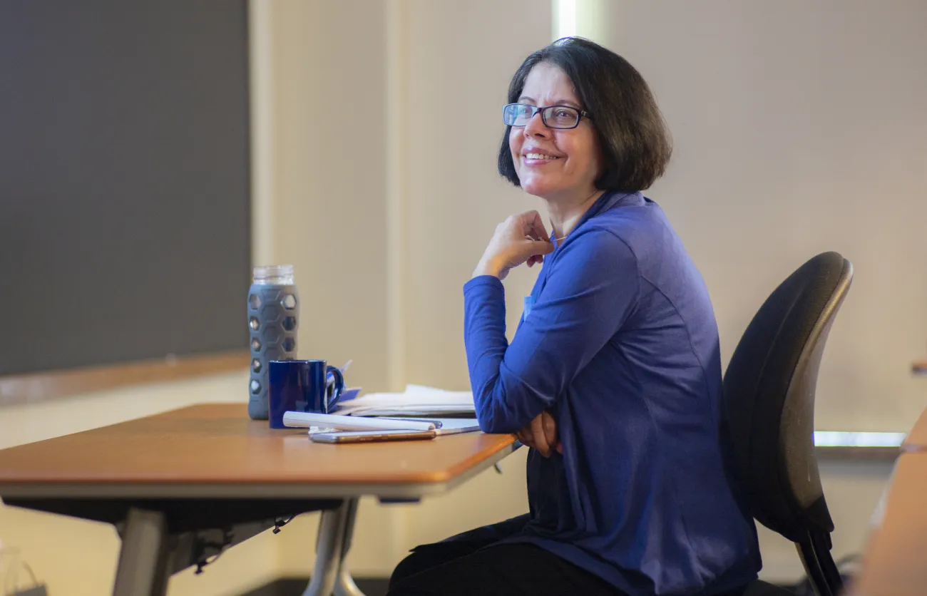 professor sitting in chair