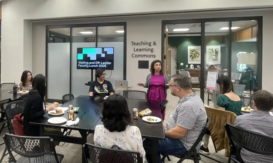 Staff gather outside of the TLC offices