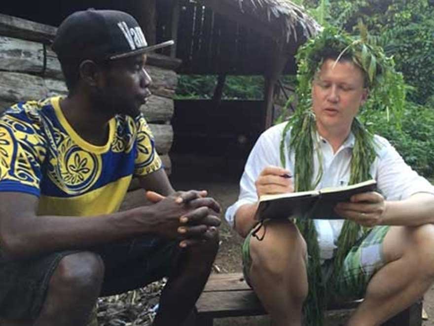 K. David Harrison interviewing a consultant in Vanuatu about ethnobotanical knowledge..