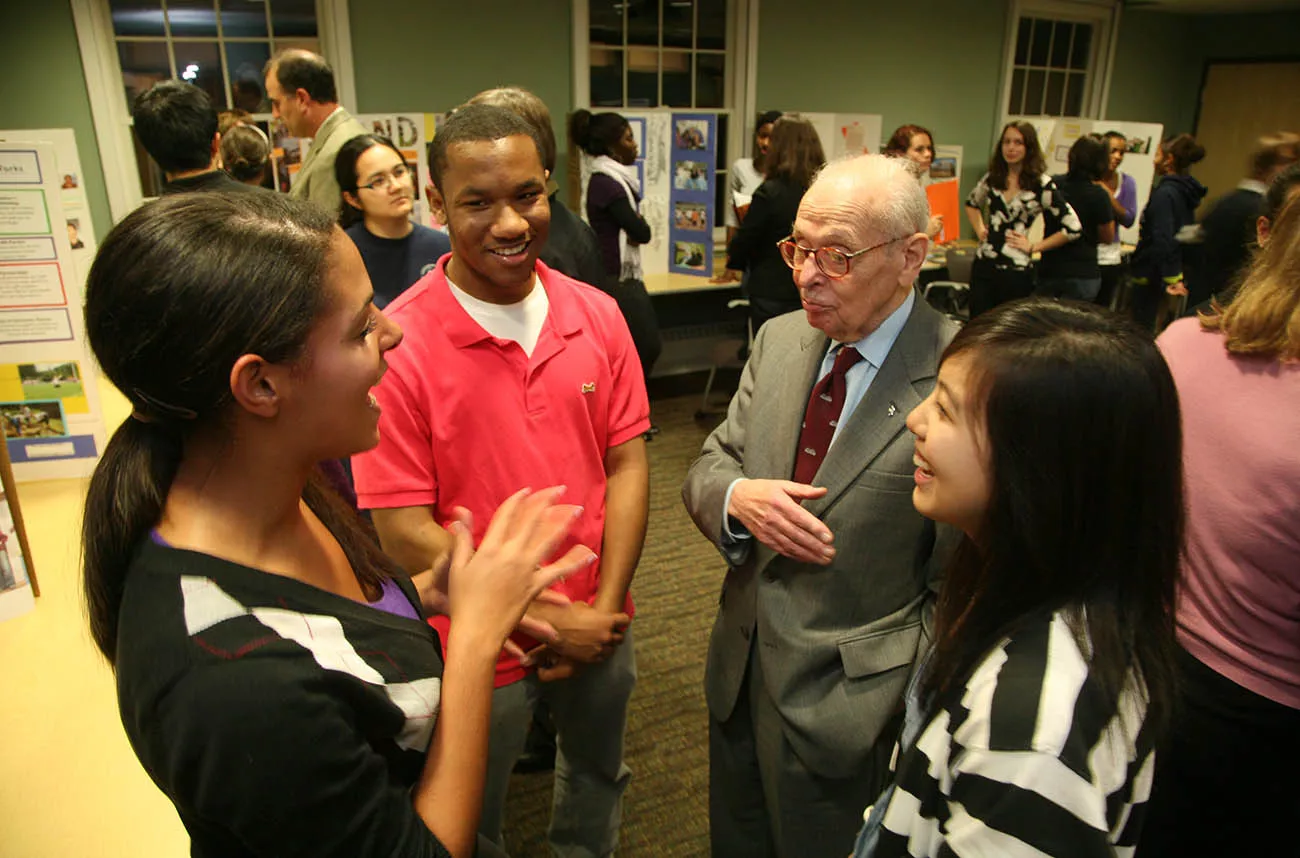 Eugene M. Lang ’38 with students