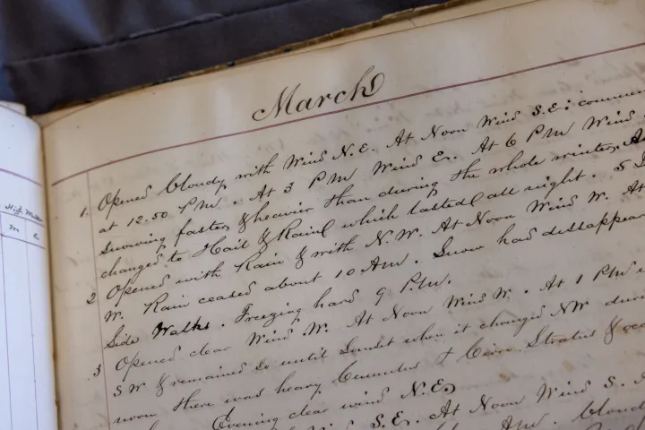 close up photograph of a notebook kept by Frank Ball