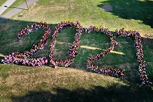 Class of 2027 members spell out large 