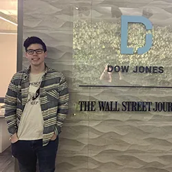 Bryce Mick '21 stands at Wall Street Journal office