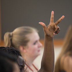 Closeup of fingers in American Sign Language Class