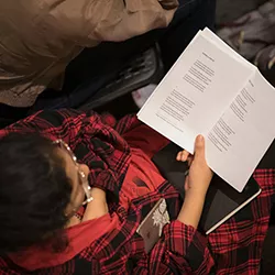Overhead shot of person reading book