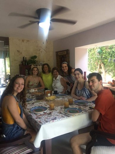 students at host family dinner in Merida, Mexico