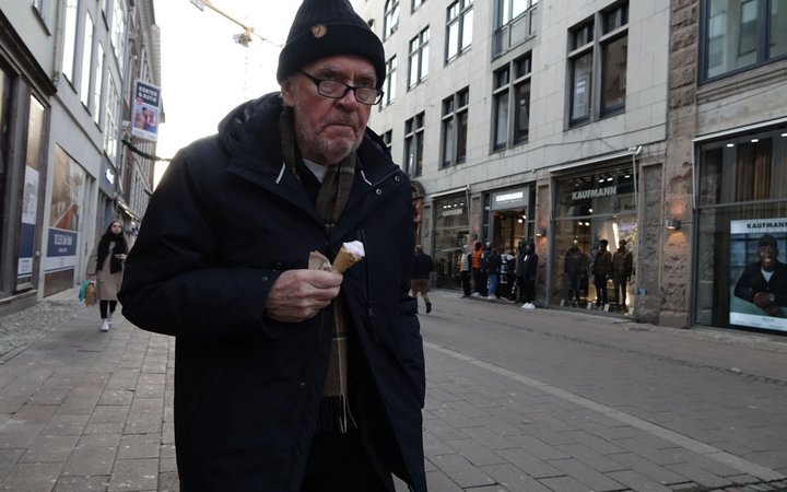 Man eating ice cream on the street