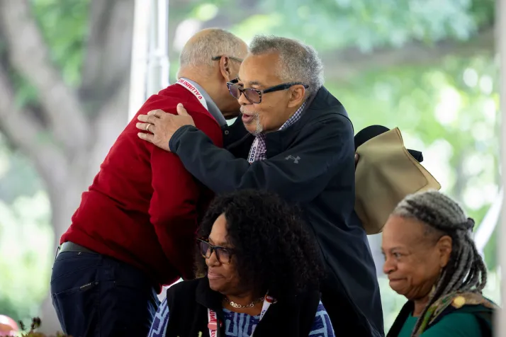 Alumni hug