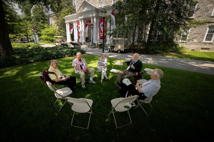 Alumni sitting in circle of chairs