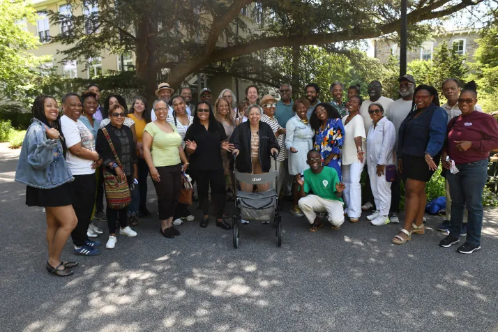 Group of black alumni congregate near Robinson House and BCC