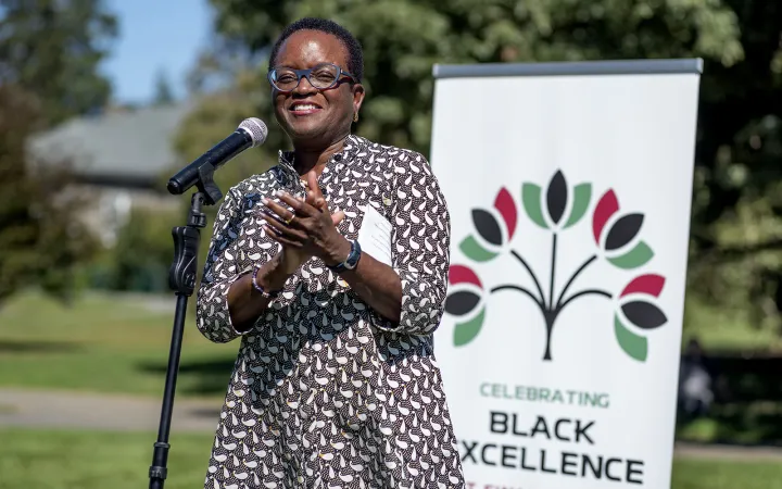 Valerie Smith at microphone