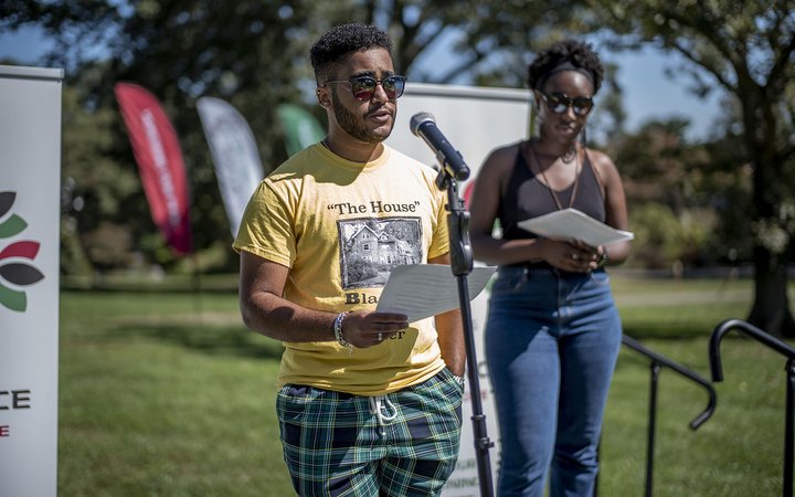 Joe Green '21 at microphone, Taylor Tucker '20 behind