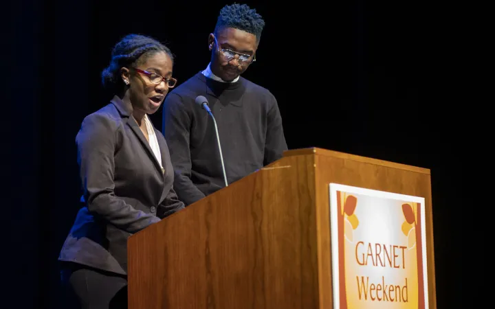 Shelby Billups '20 and Tyler White '22 at podium