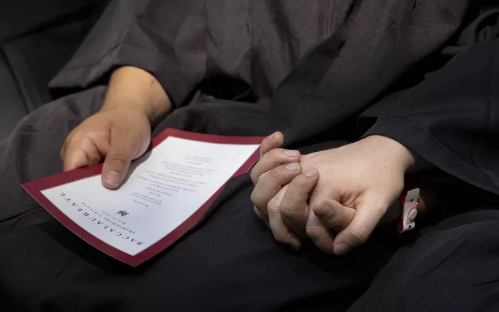 students holding hands