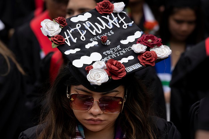 A student wears a decorated graduation cap