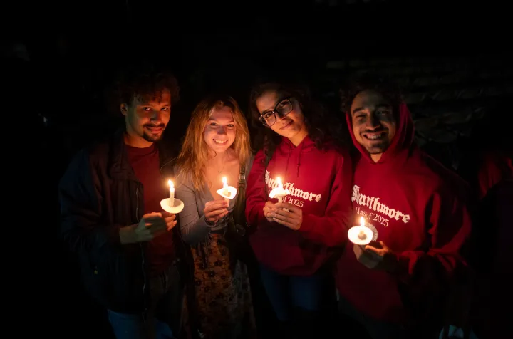 Students with candles at Last Collection