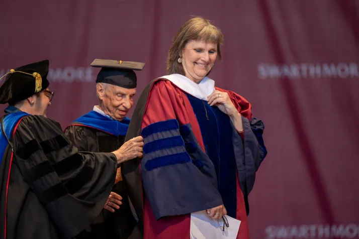 Kim Cassidy receives hood at commencement