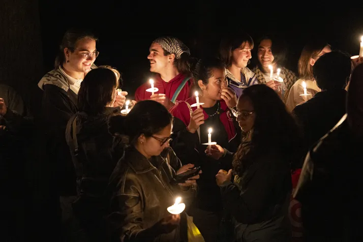 Students convene with candles for last collection ceremony