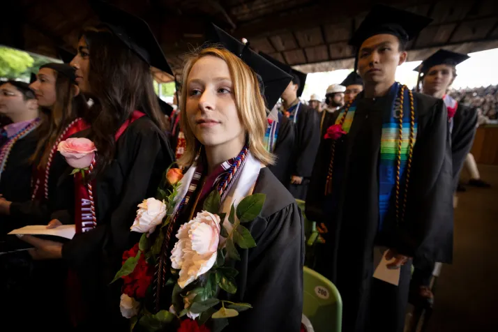 Students gather in seats fro grad ceremony
