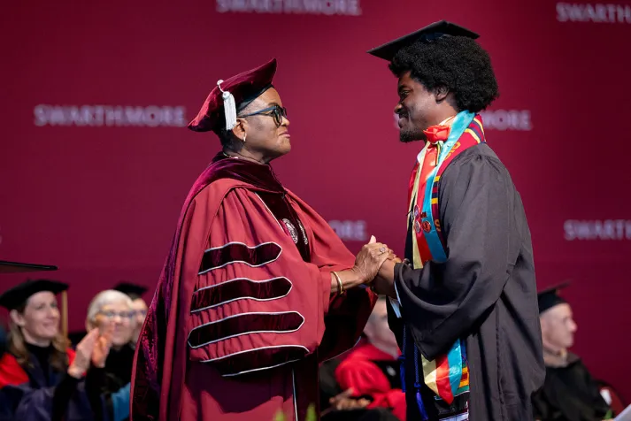 Val Smith with student at commencement