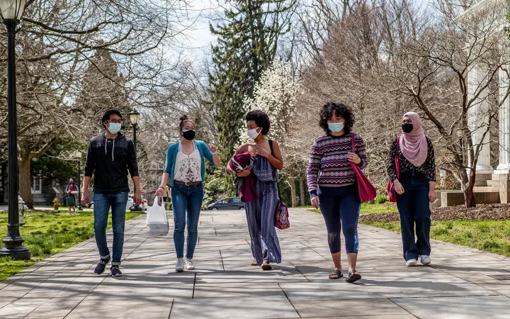 students walking on campus