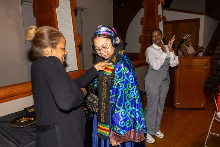 student receives stole at BCC event