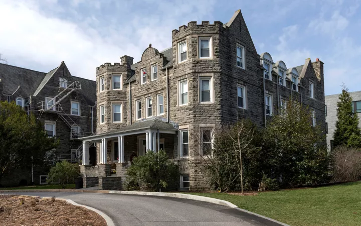 exterior of 3-story stone building