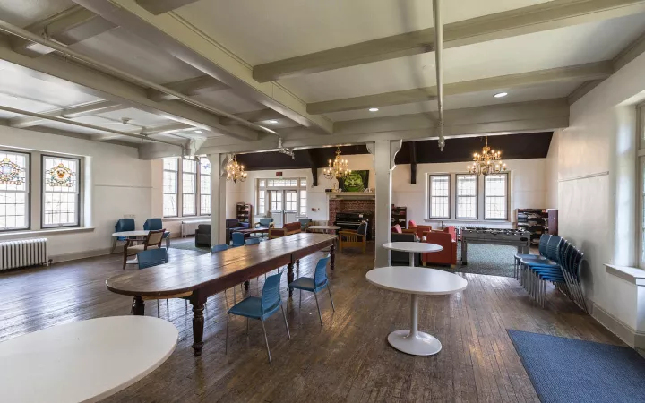 Breakfast room in Mary Lyons dorm with wooden floor and tables