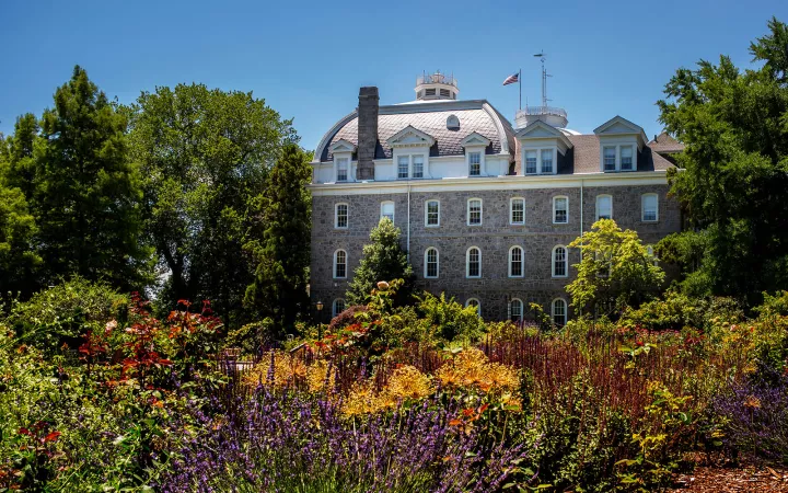 rose garden in bloom and parrish hall