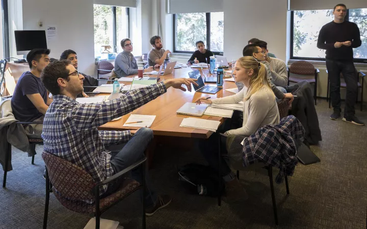 students talking in class