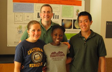 Stephen Miller in his lab with a group of students.