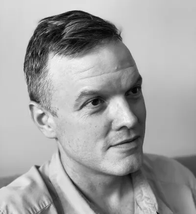 Associate Professor of Art Logan Grider, black and white headshot