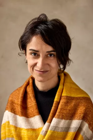 Headshot of woman with short hair.