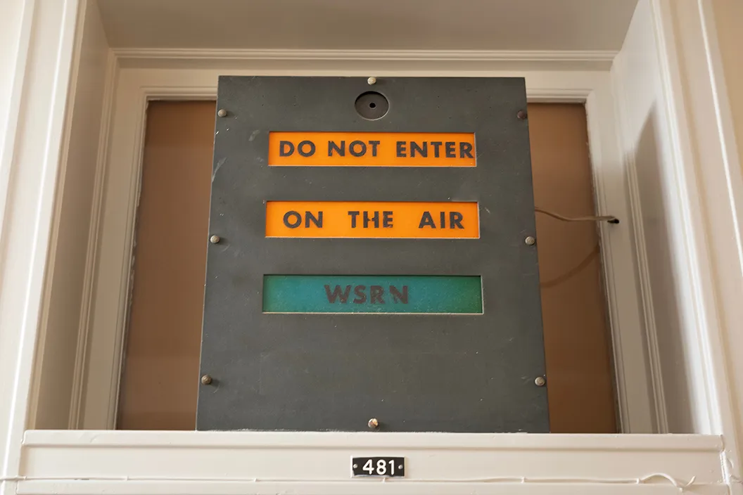 Sign at radio station that reads "DO NOT ENTER ON AIR"