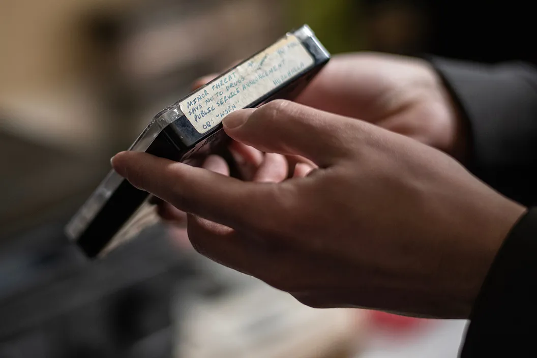 CLoseup of person holding cassette tape