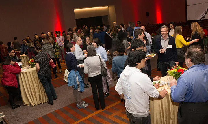 Students and alums at reception for Valerie Smith