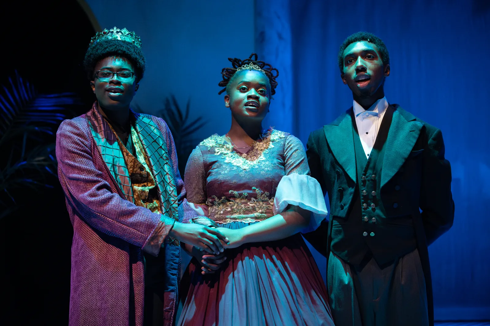 Aidan Carroll, Natassia Lowe, and Justin Gayles as The King, The Queen, and Lionel