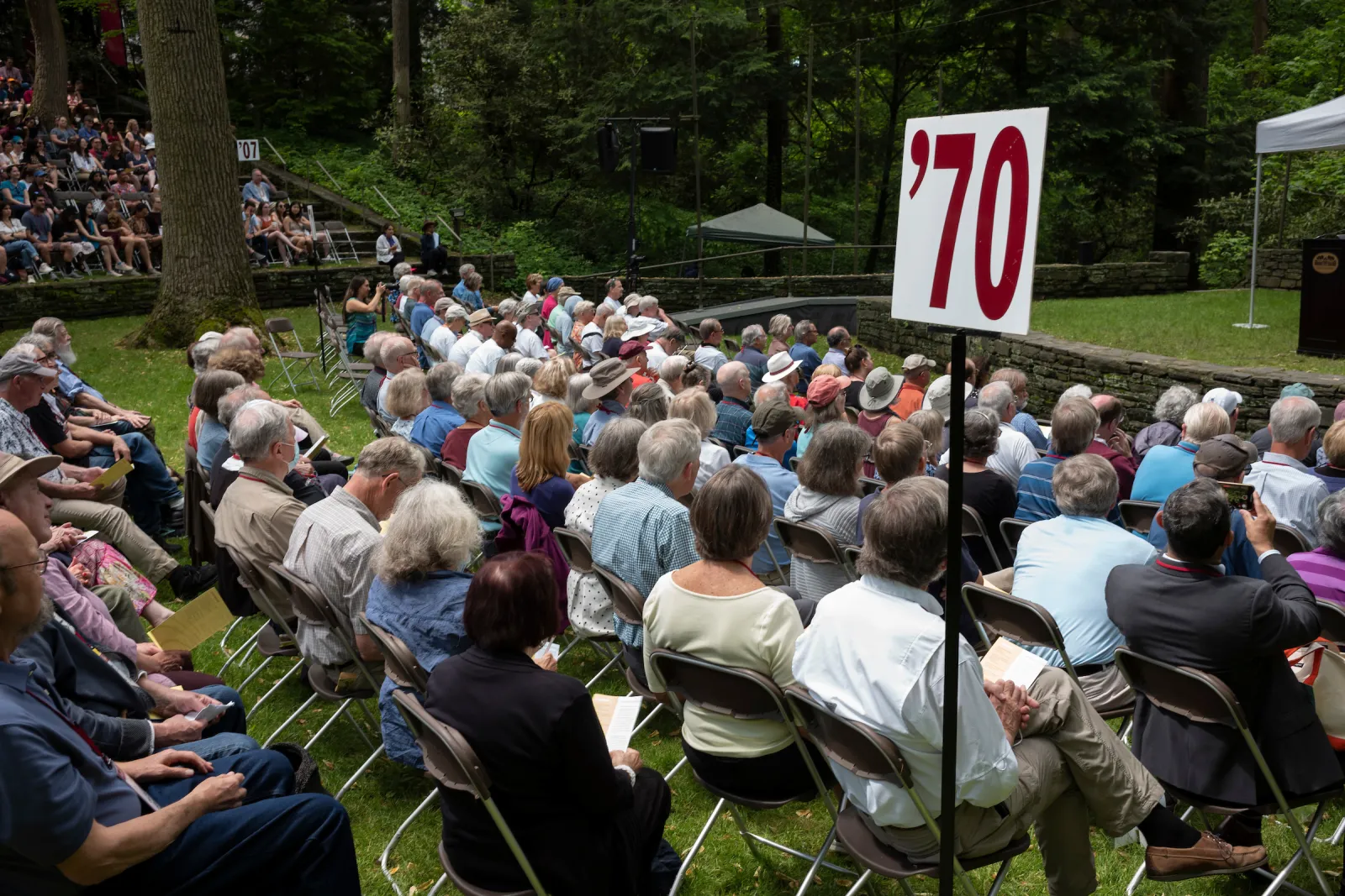 Alumni gather in amphitheater