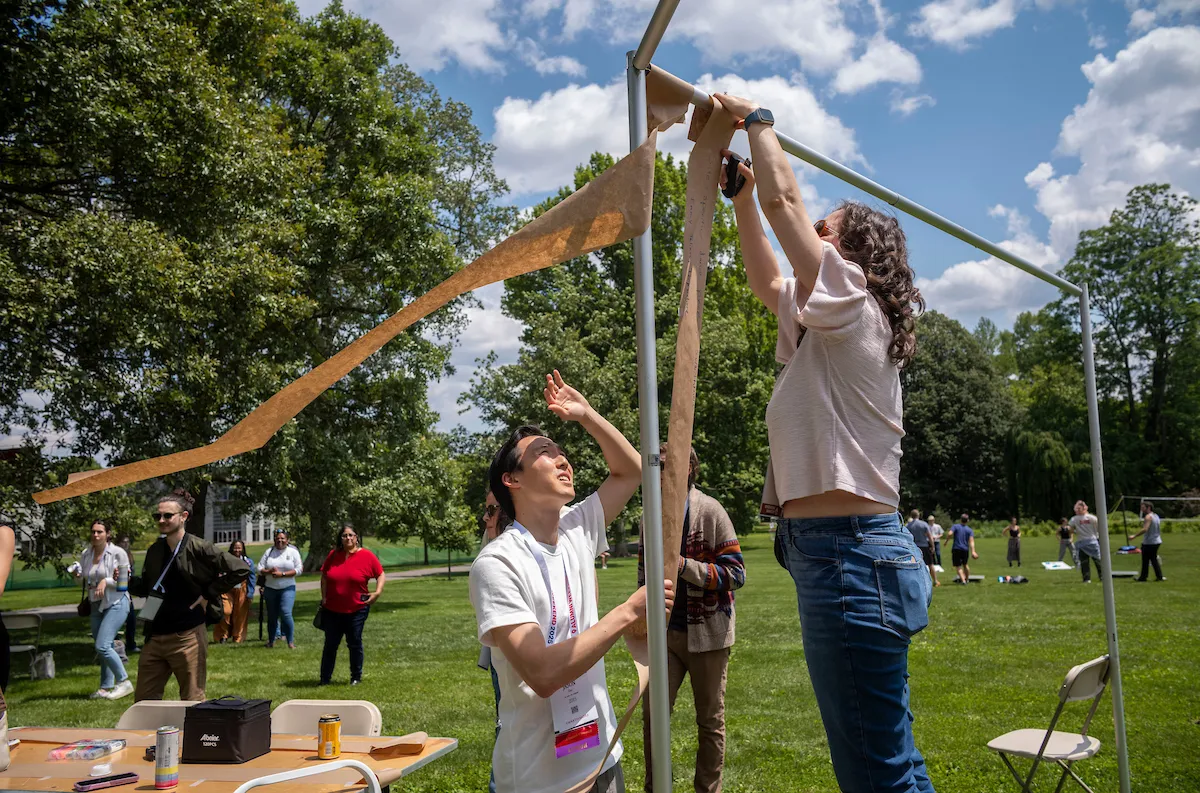 Alums build structure outside