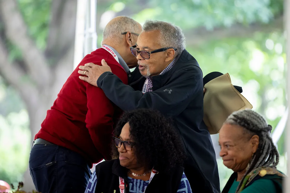 Alumni hug